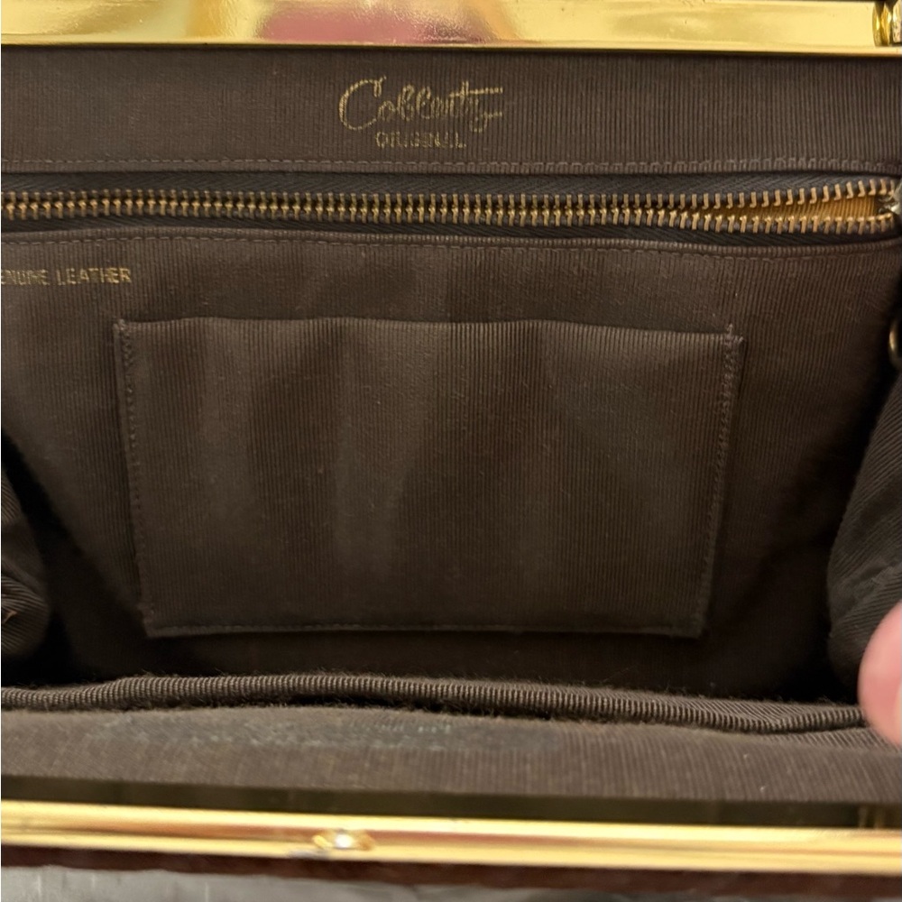 Chic Brown Leather Clutch by Coblentz